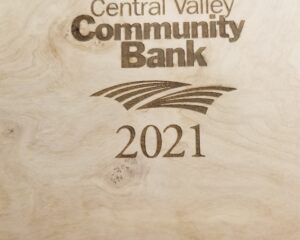 Custom laser engraved wood plaque featuring Central Valley Community Bank logo 2021