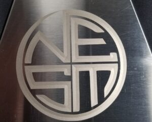 Custom laser engraved circular metal monogram sign