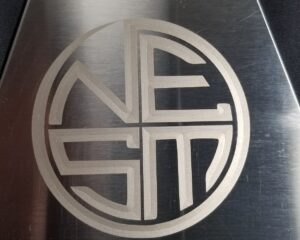 Custom laser engraved circular metal monogram sign