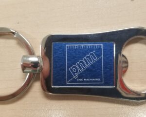 Custom laser engraved blue metal keychain with company logo
