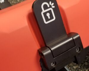 Custom laser etched lock symbol on precision machinery hardware